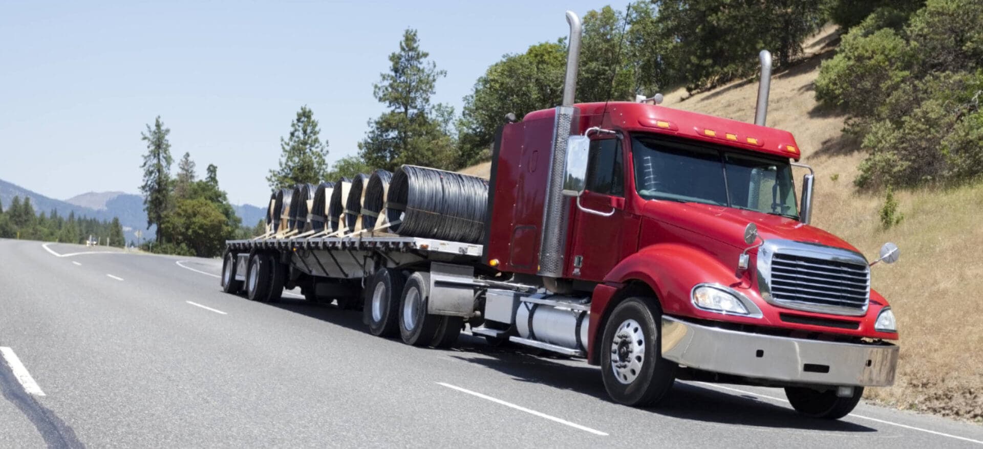 red truck running on daytime