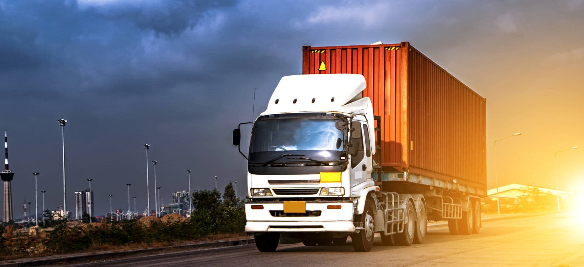 white truck with a red cargo