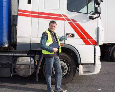 a professional truck driver smiling