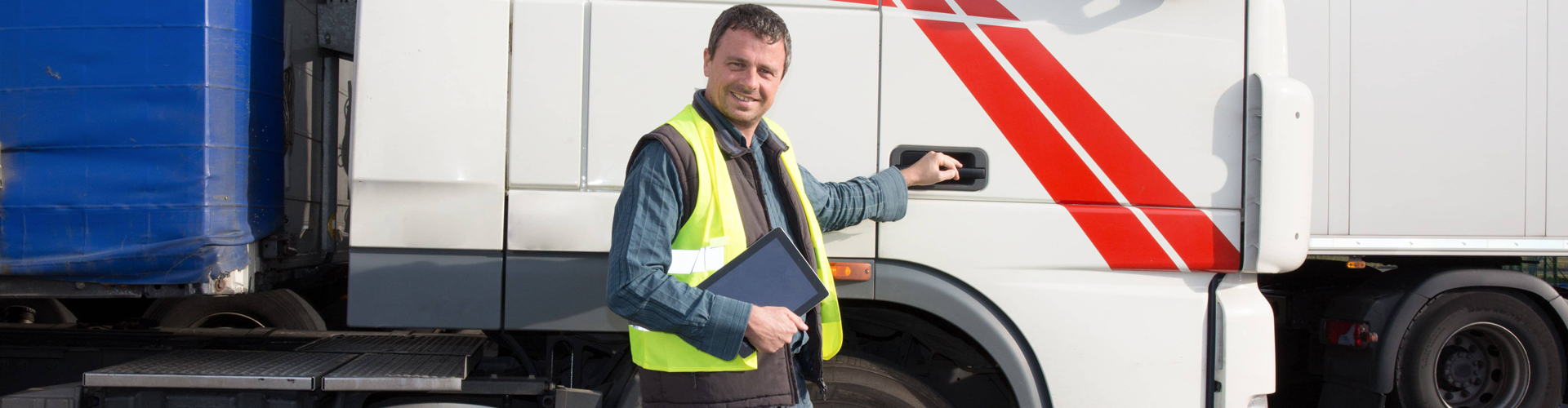 a professional truck driver smiling