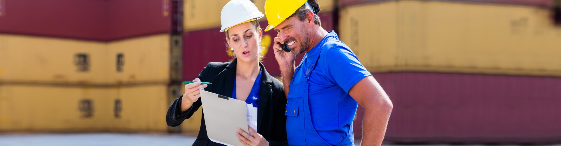 two logistics employees having a discussion
